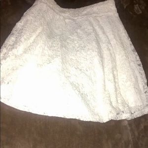 Woman’s cream lace mini skirt